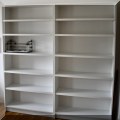 F34. White bookcases. 